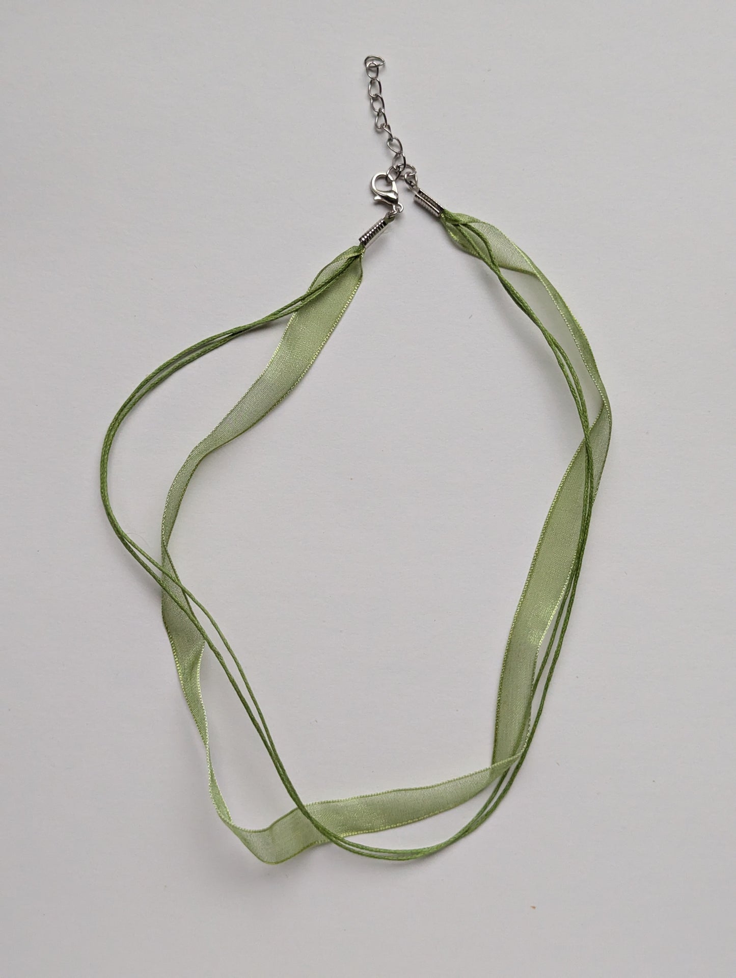 green cotton cord organza ribbon necklace with silver metallic clasp and adjustable chain