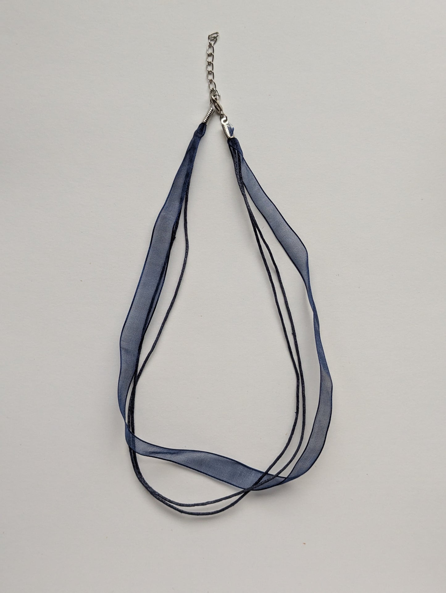 dark blue cotton cord organza ribbon necklace with silver metallic clasp and adjustable chain