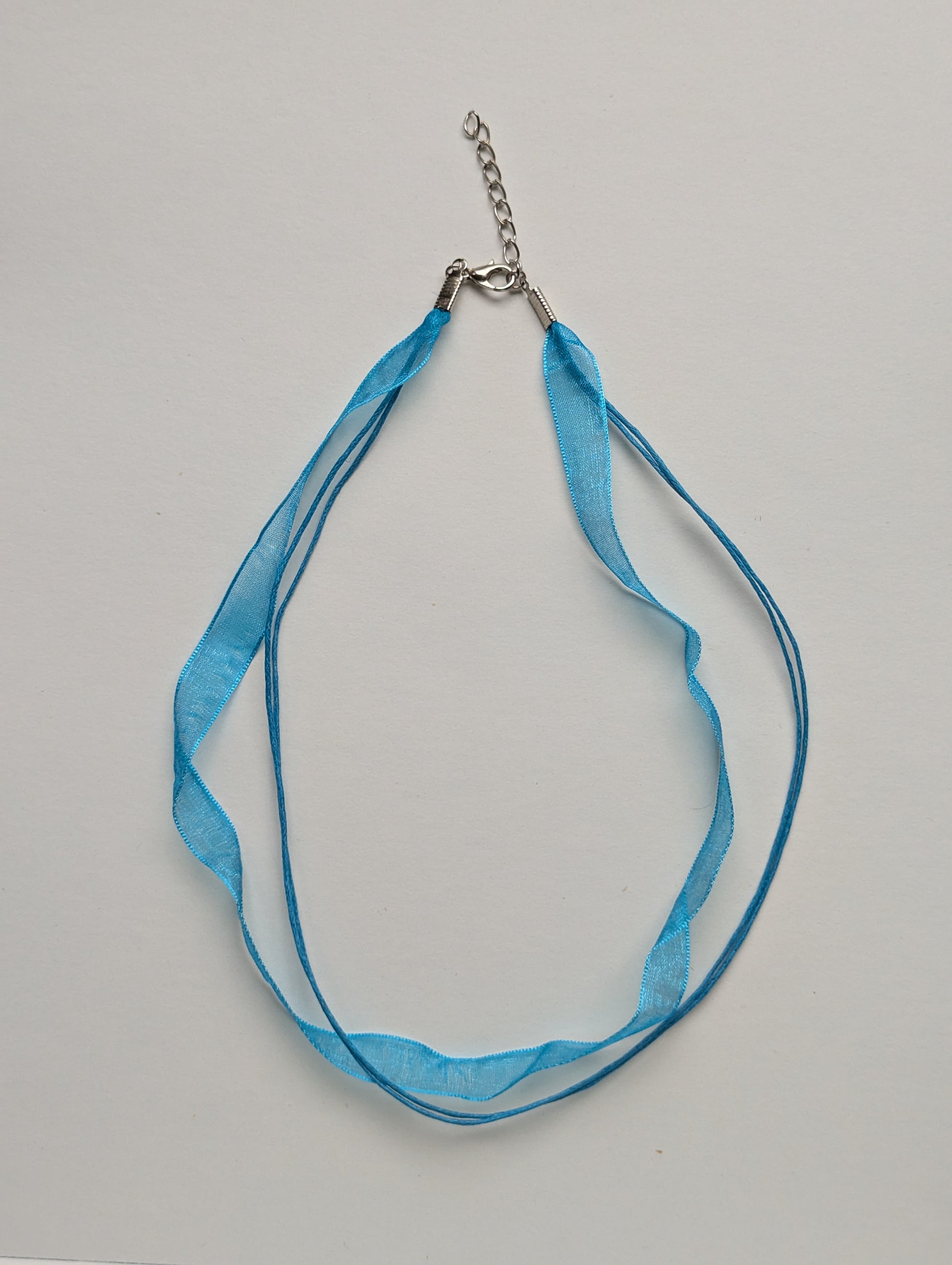 light blue cotton cord organza ribbon necklace with silver metallic clasp and adjustable chain