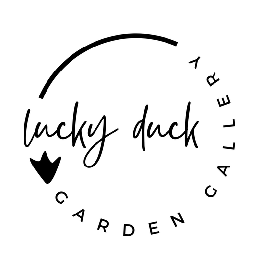 A logo that says "Lucky Duck Garden Gallery" 